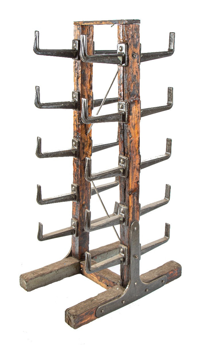 refinished original early 20th century robust factory machine shop custom-built pipe rack comprised of bolted wood and heavy duty cast iron brackets