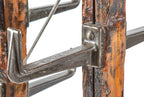 refinished original early 20th century robust factory machine shop custom-built pipe rack comprised of bolted wood and heavy duty cast iron brackets