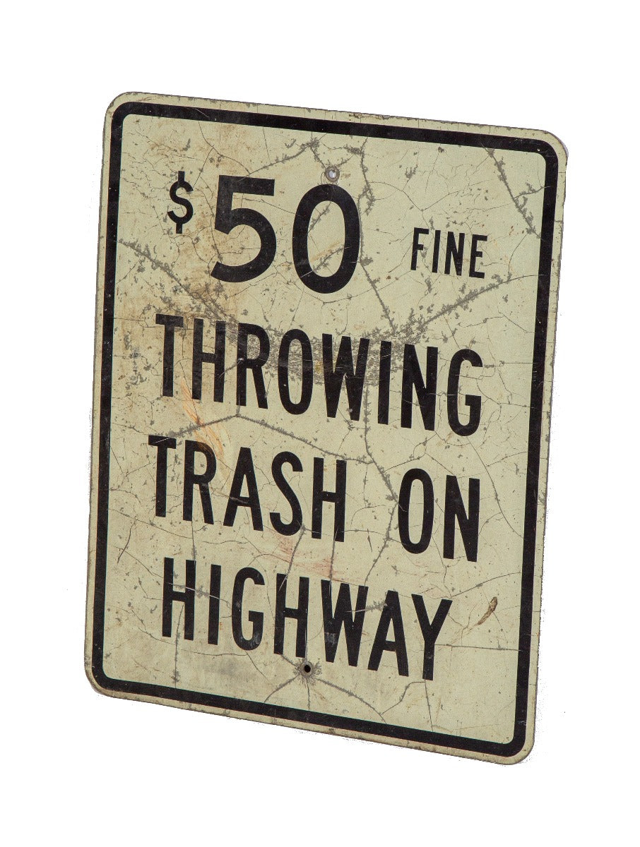 original american single-sided vintage die cut steel "trash on highway" weathered sign