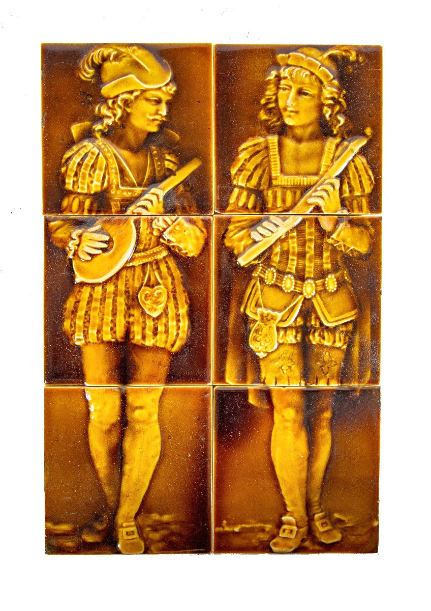set of original seldom found 19th century salvaged chicago full-figured butterscotch-colored figural fireplace tiles