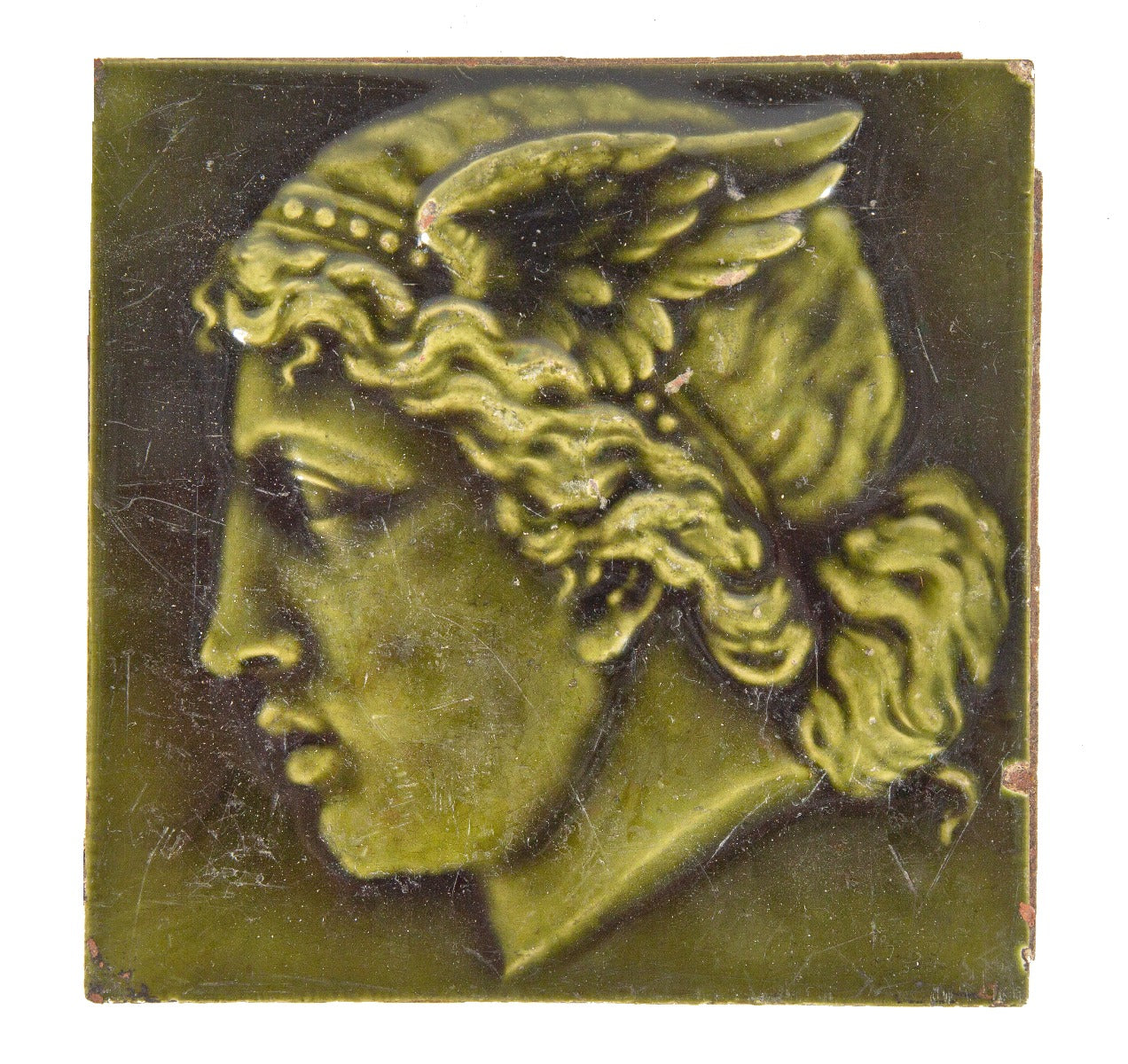 original 19th century antique american dark green majolica-glazed fireplace corner tile depicting roman god mercury