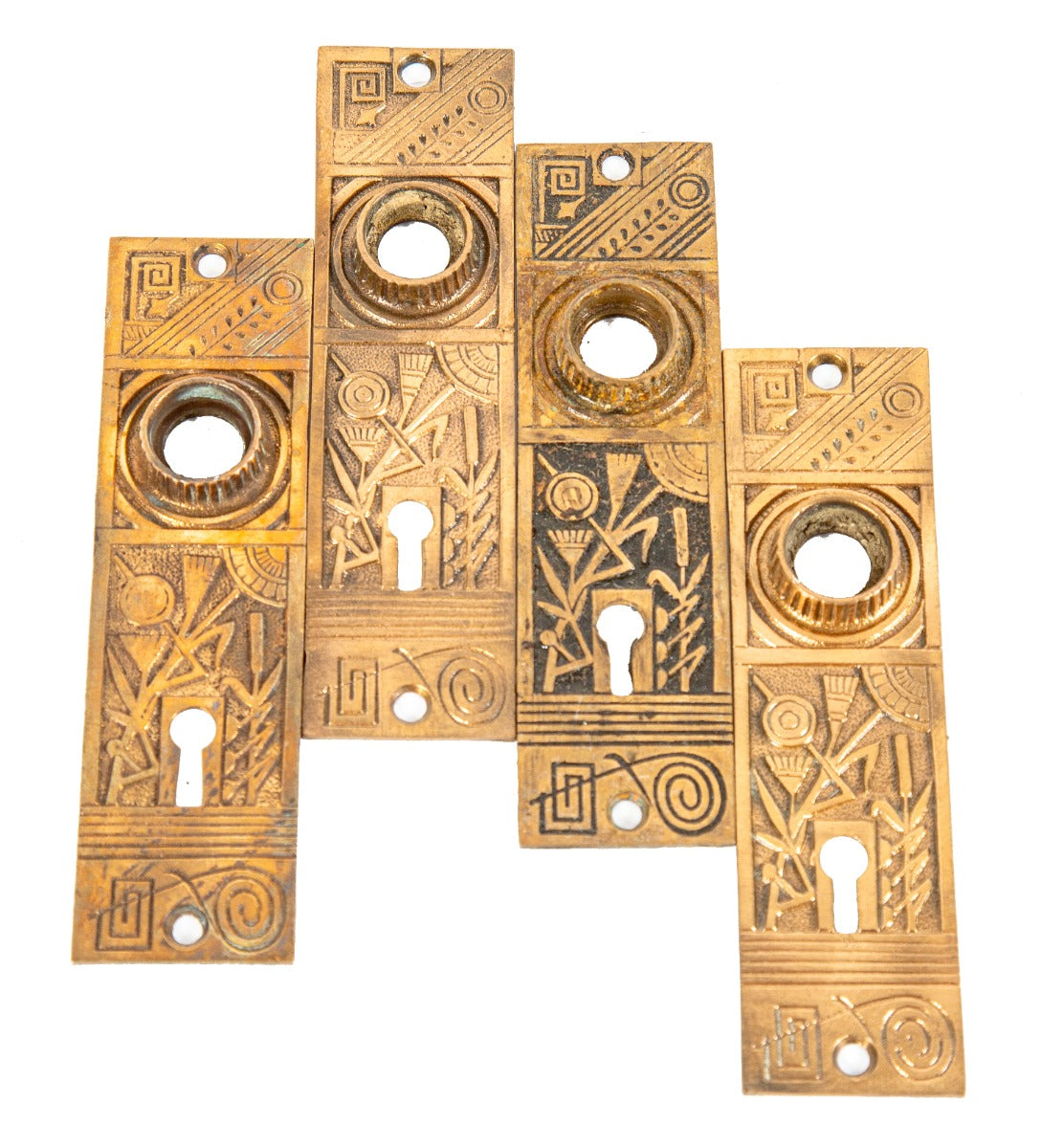 group of four matching ornamental cast brass eastlake style 1880s interior residential nashua passage door backplates