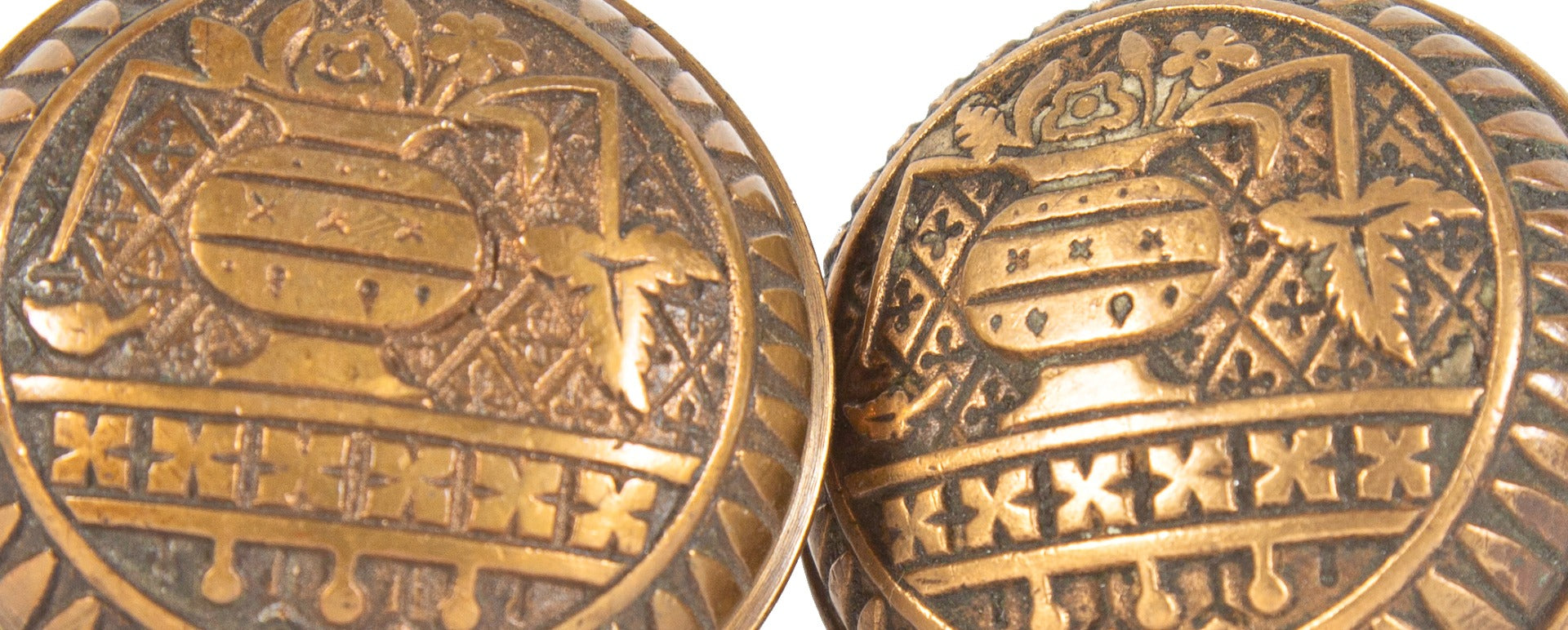 one of three matching salvaged chicago "broken leaf" dome-shaped residential doorknobs with nicely aged patina