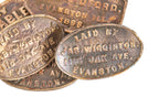 group of very rare 19th and early 20th century cast brass and bronze evanston concrete sidewalk markers