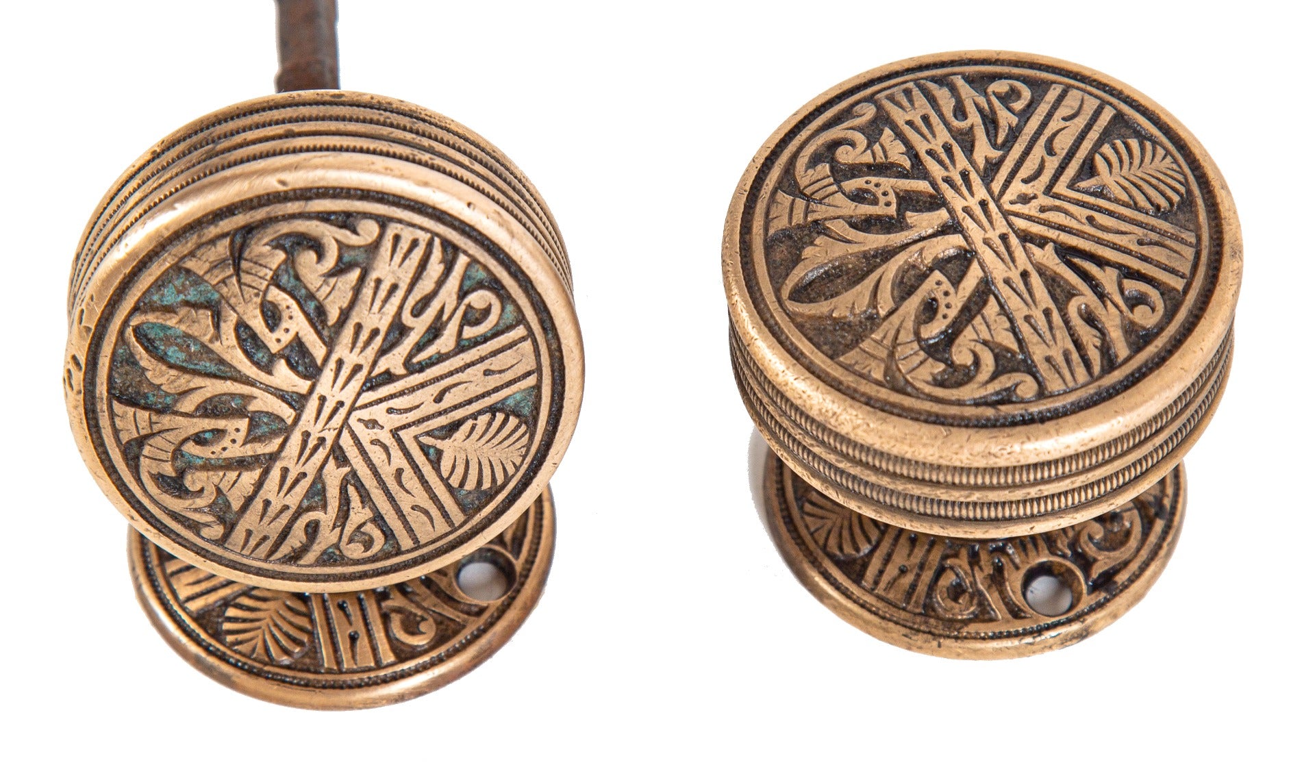 highly desirable 19th century american eastlake style drum-shaped "oriental" pattern cast brass doorknobs with matching rosettes