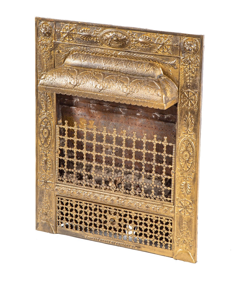 one of two matching 19th century original salvaged chicago residential fireplace "lion gas grate" with gold enameled finish