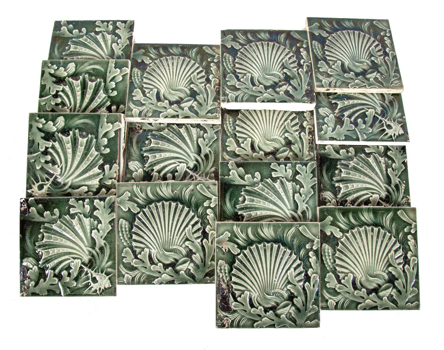 group of 19th century matching deeply embossed richly colored green majolica tiles designed by isaac broome