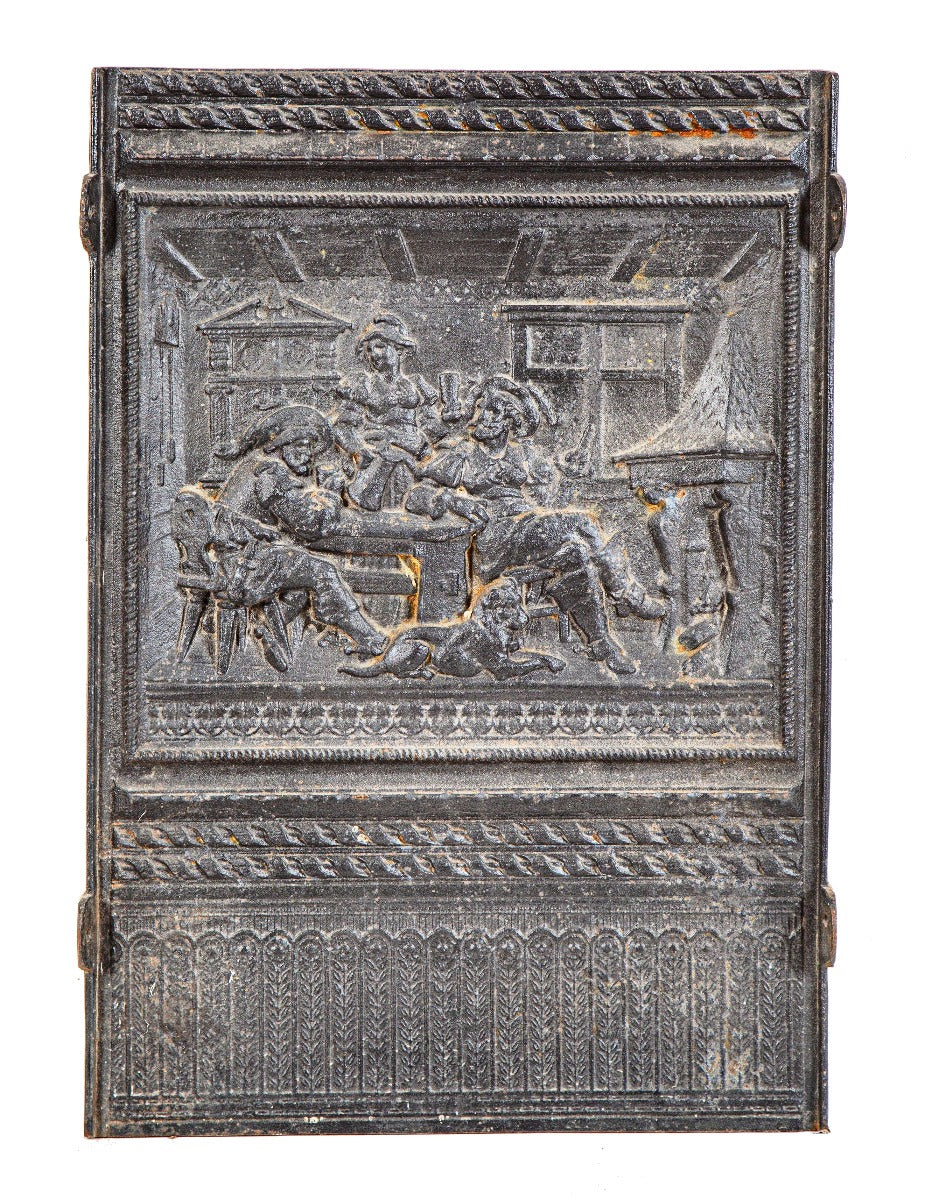 hard to find 19th century ornamental cast iron figural medieval bar scene mantel fireback pane with black enameled finish