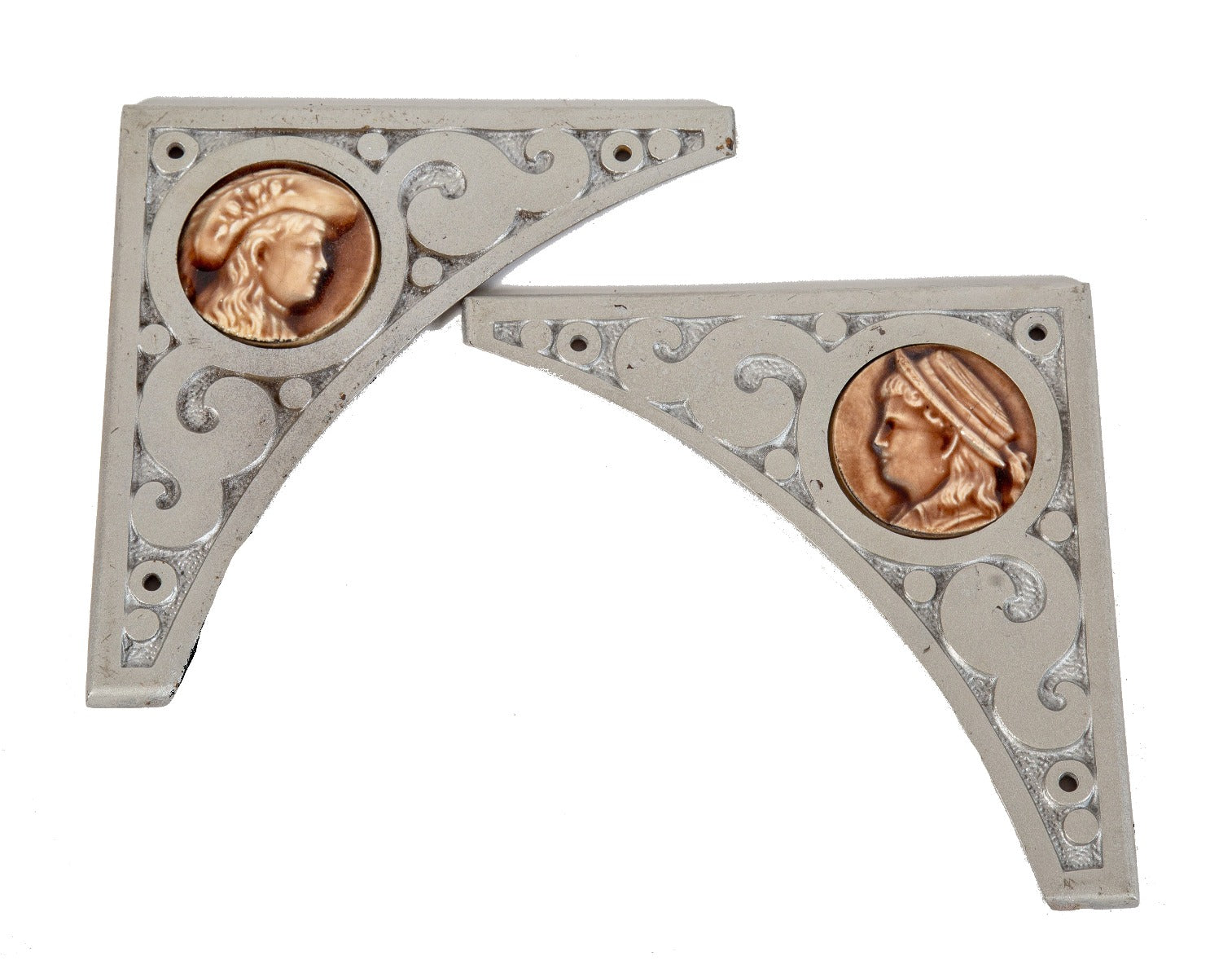 pair of original refinished 19th century cast iron stock brackets with detachable majolica figural tiles