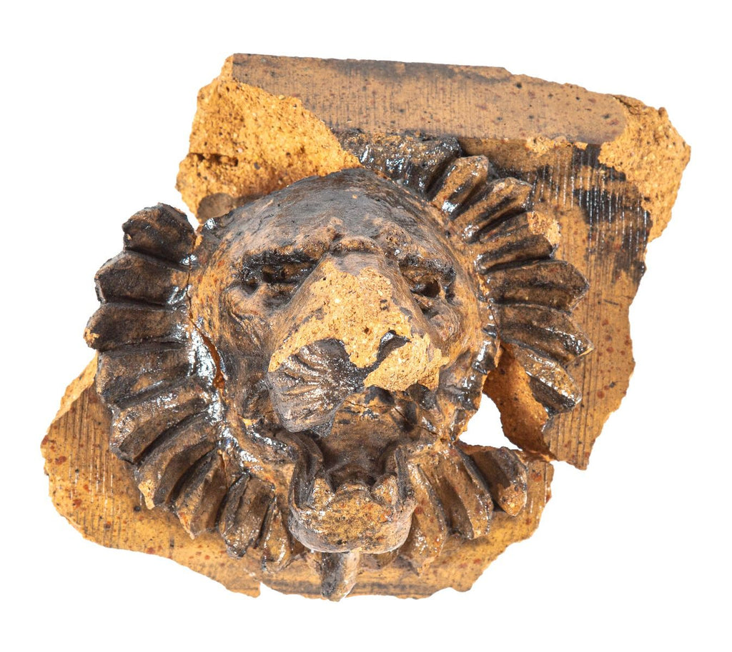 henry schlacks-designed speckled glazed salvaged terra cotta st. bonafice school lionhead fragment