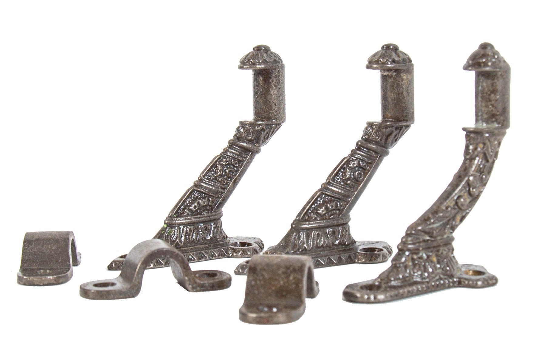 three late 19th century antique american ornamental cast iron handrail brackets with brushed metal finish