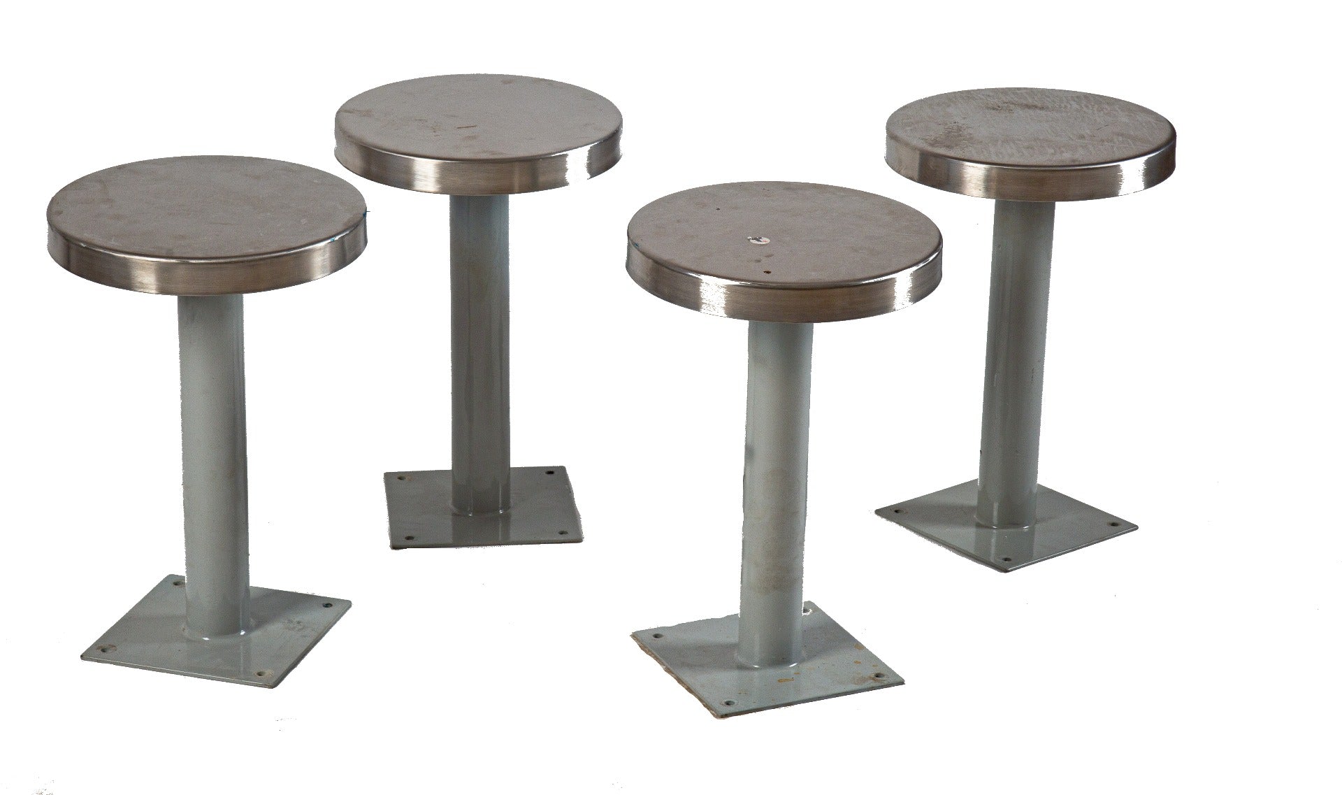 group of four matching heavy duty freestanding cook county jail prison cell desk stools with stainless steel seats