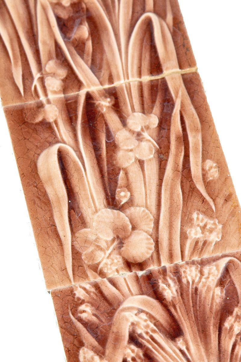 original 19th century rose-colored american victorian fireplace tile set featuring embossed cattails