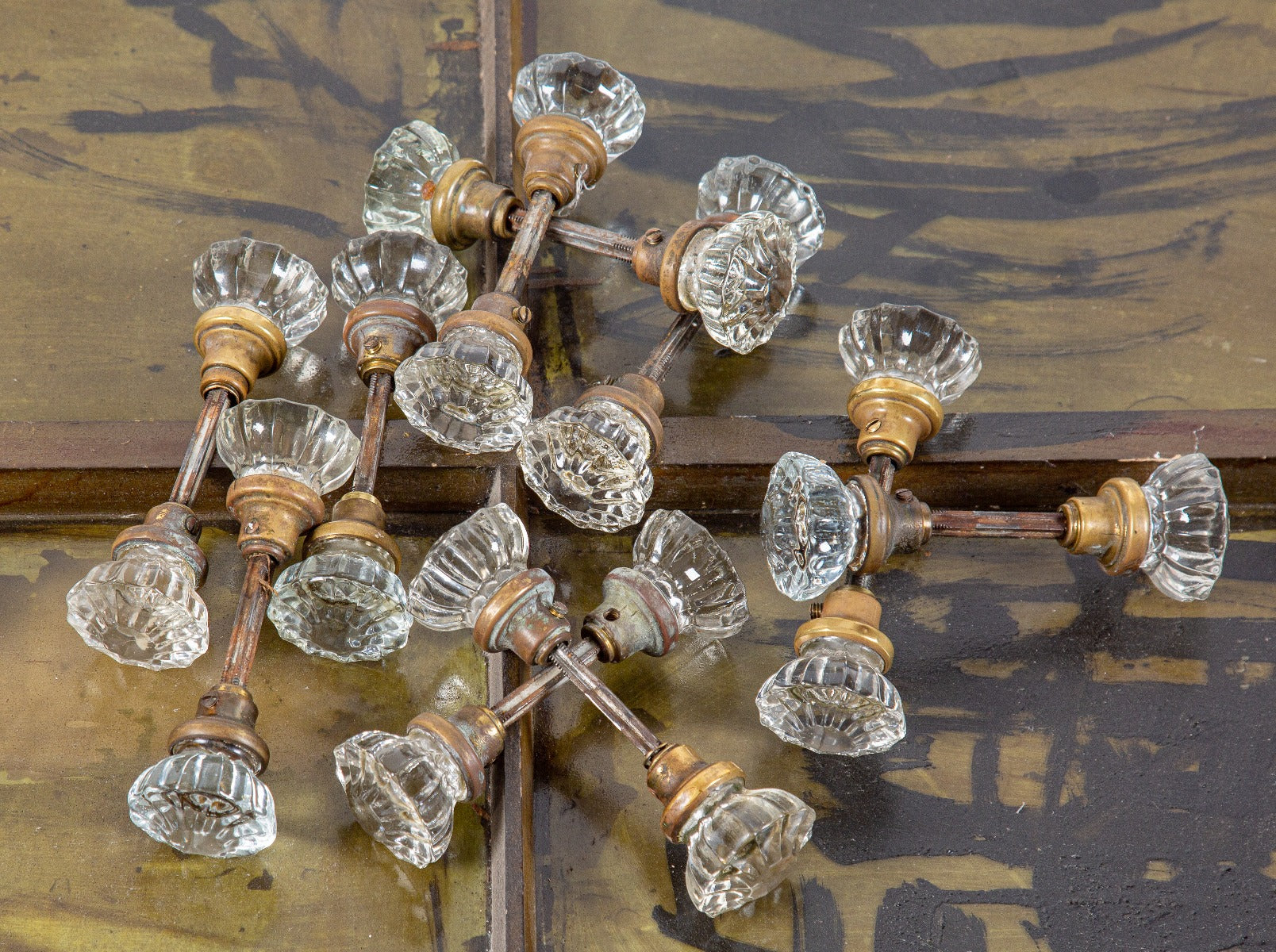 ten matching original early 20th century antique american residential pressed glass passage door handles