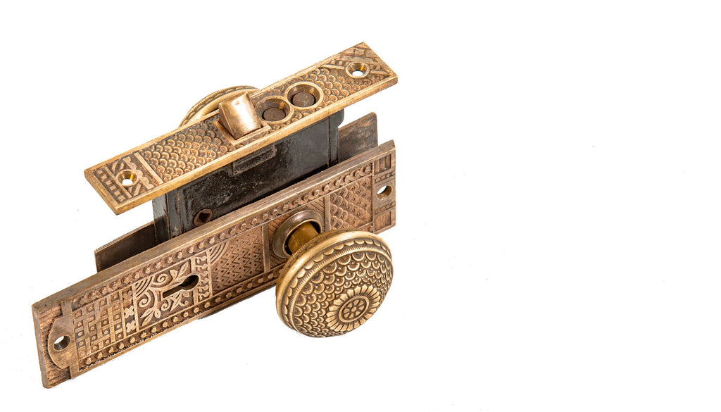 original highly sought after "daisy" pattern ornamental cast brass 1880s eastlake style entrance door hardware