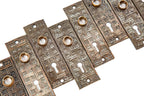 large lot of matching ornamental cast iron passage door backplates with unique lattice work design motif
