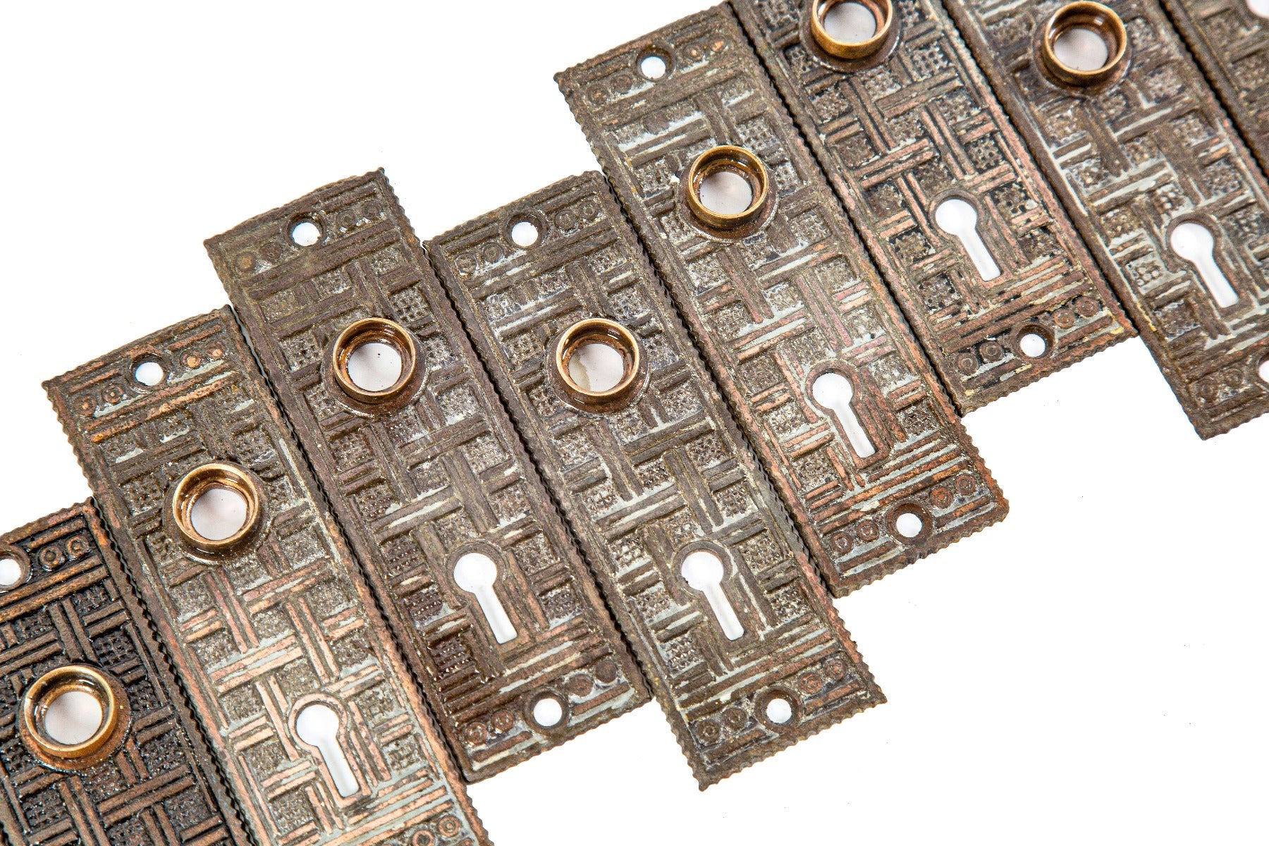 large lot of matching ornamental cast iron passage door backplates with unique lattice work design motif