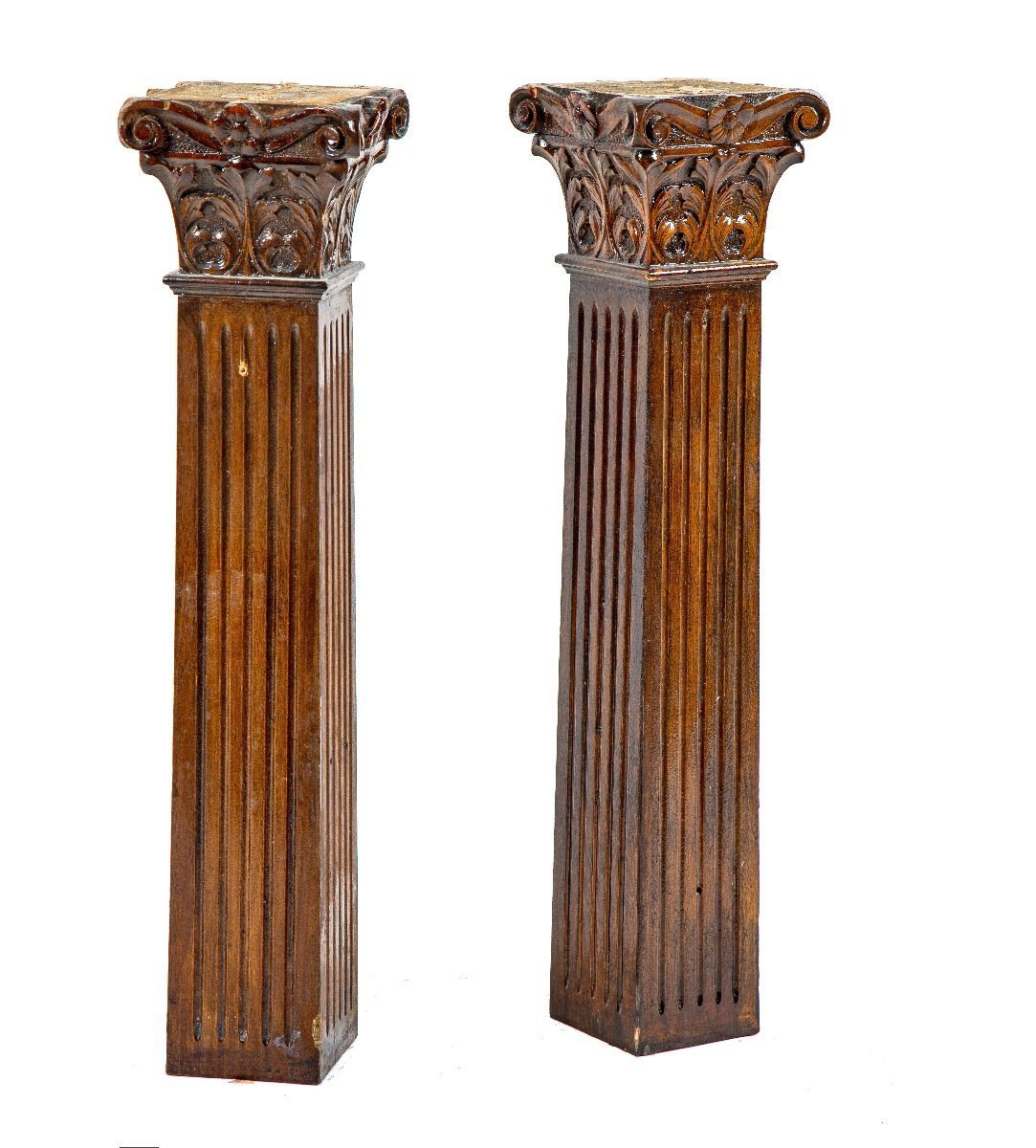 two matching 19th century solid cherry diminutive wood columns with hand-carved capitals