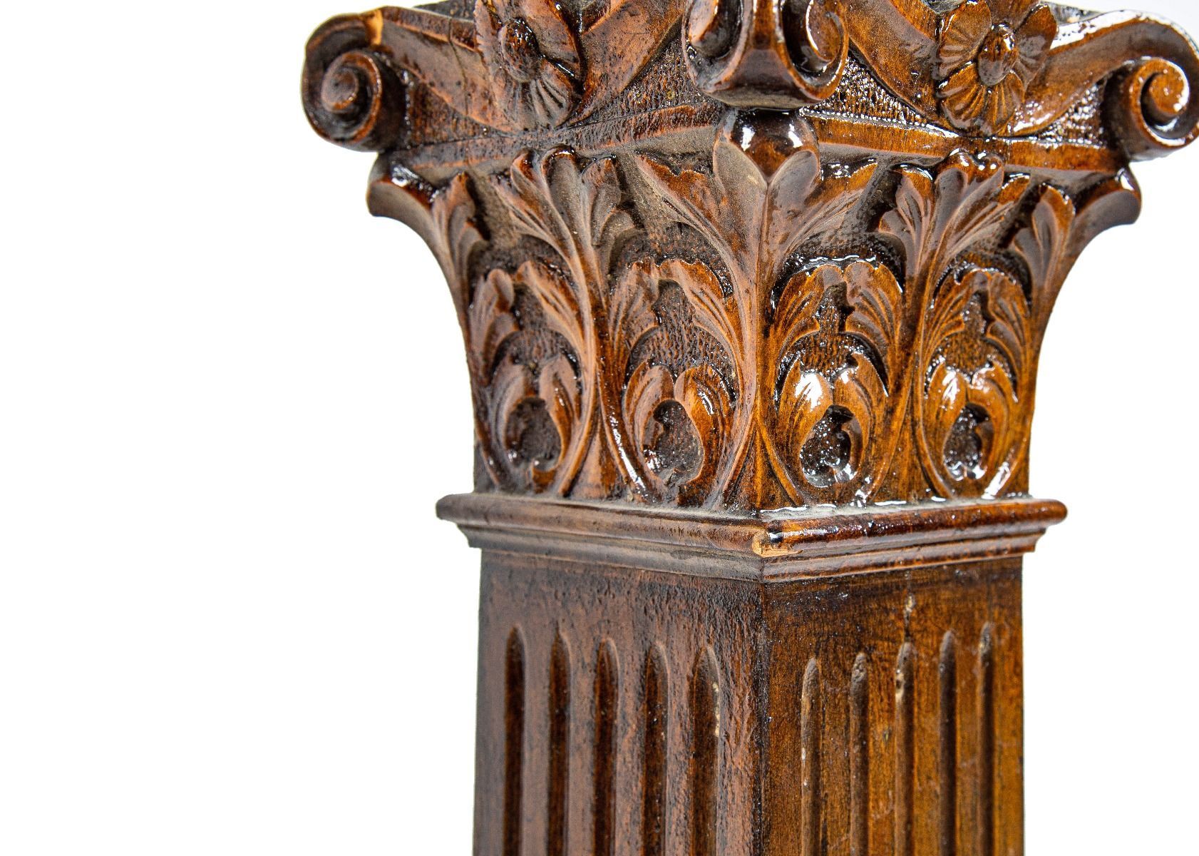 two matching 19th century solid cherry diminutive wood columns with hand-carved capitals