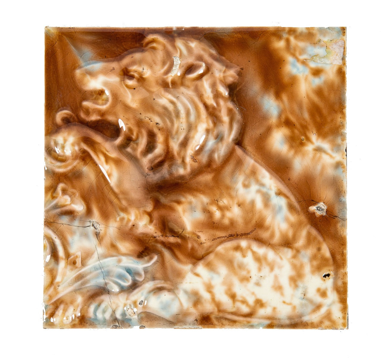 original 19th century richly colored salvaged chicago figural fireplace tile featuring a deeply embossed rearing lion