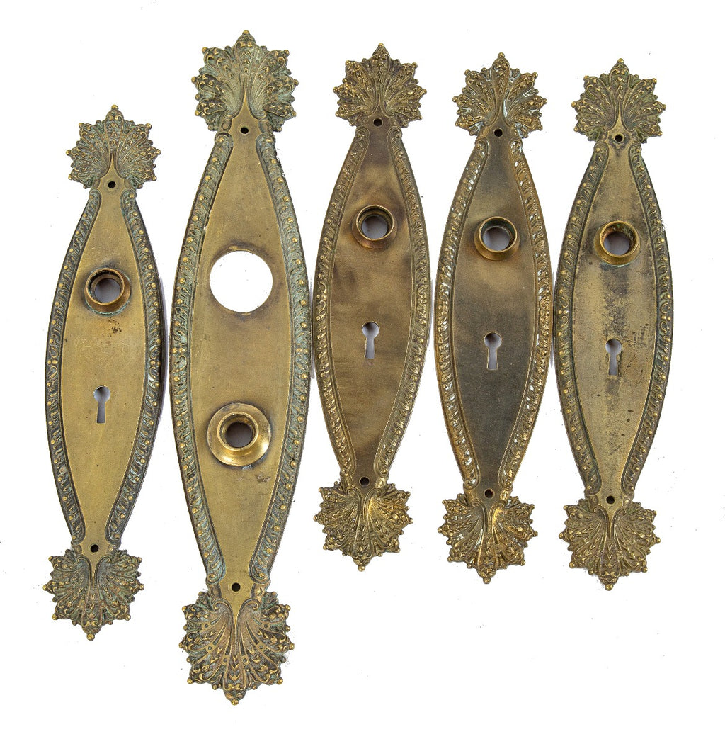 suite of original early 20th century salvaged milwaukee residential "marquise" pattern door hardware