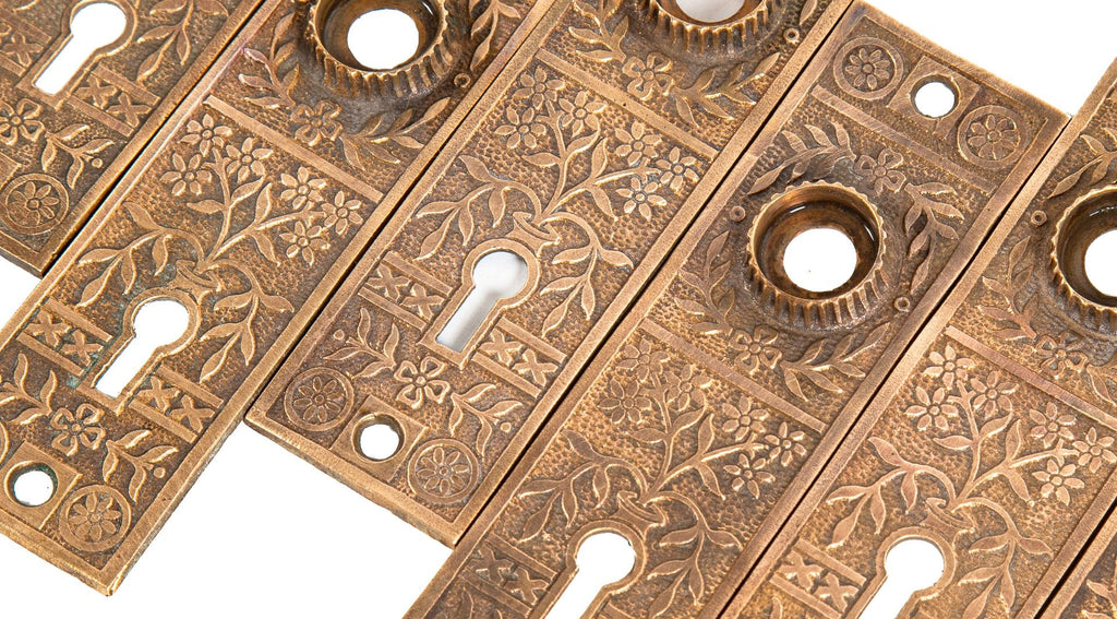 large lot of matching 19th century interior residential salvaged chicago cast brass eastlake style passage door backplates