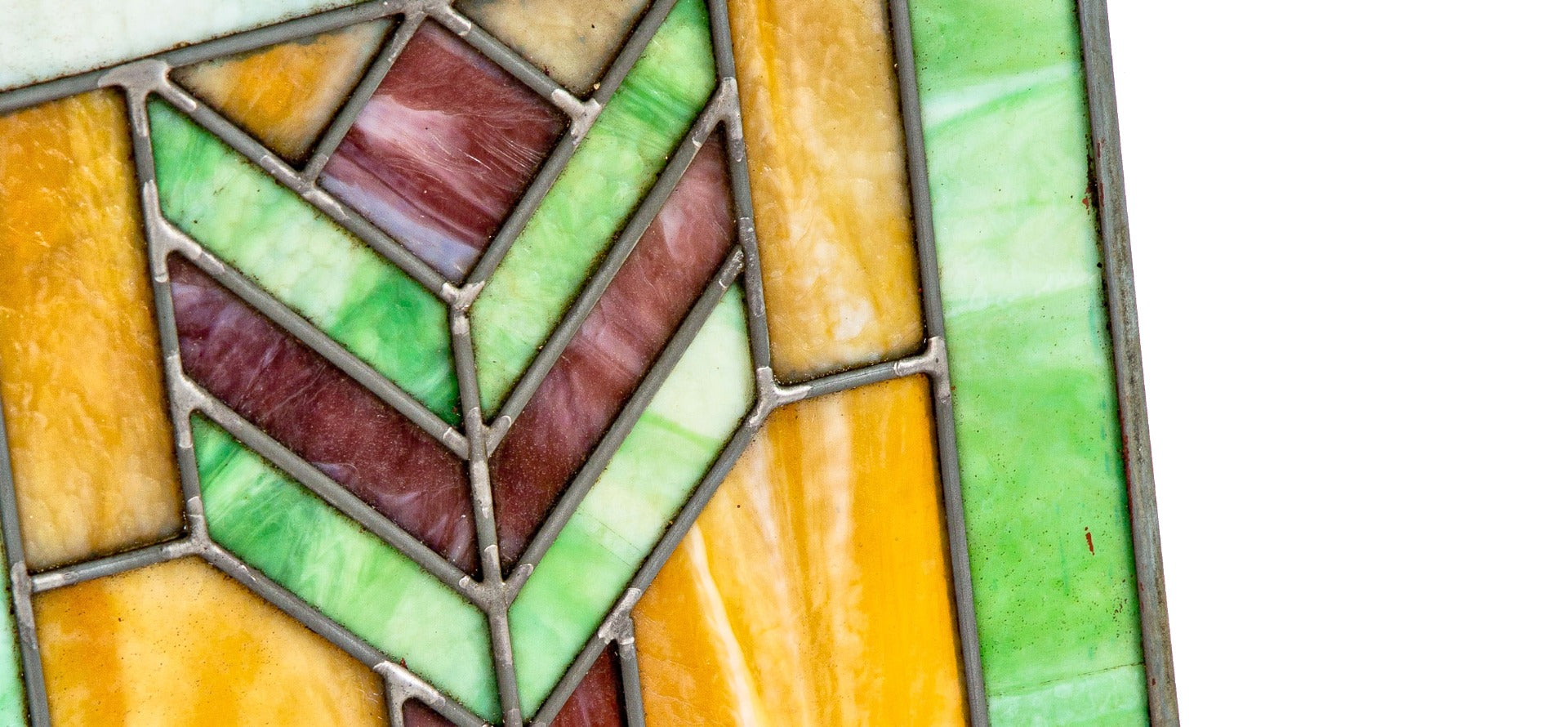 matching pair of original and completely intact prairie style chicago bungalow leaded glass windows with chevron motif