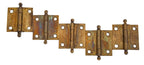 group of three antique american brass-plated wrought steel diminutive cabinet door hinges with intact ball finials