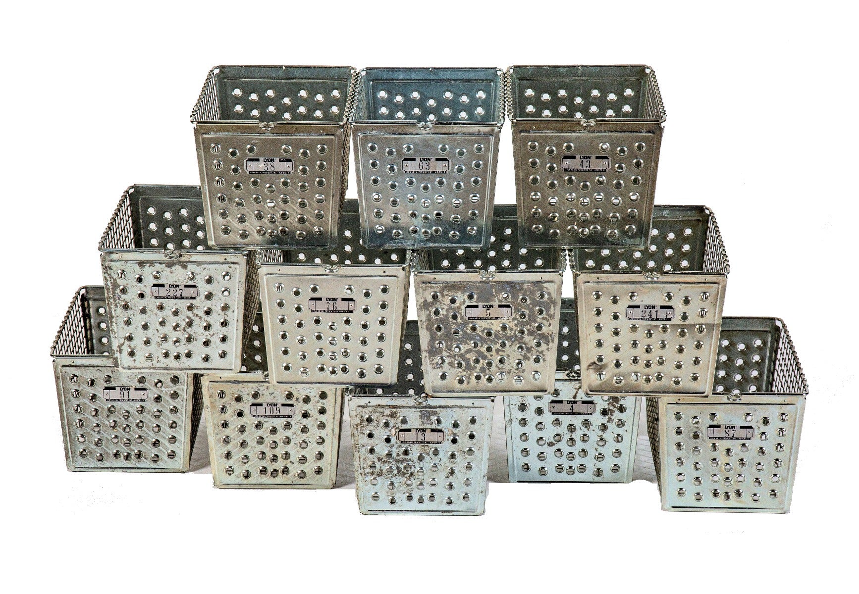 group of twelve highly desirable vintage american industrial chicago public school steel locker baskets