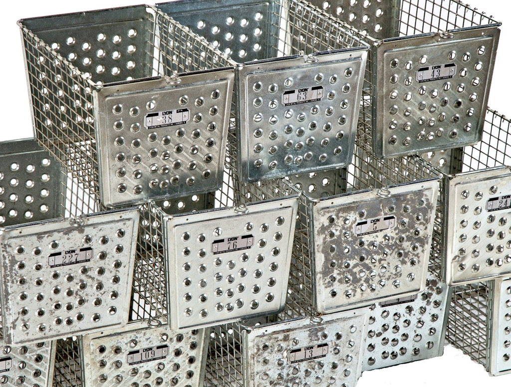 group of twelve highly desirable vintage american industrial chicago public school steel locker baskets