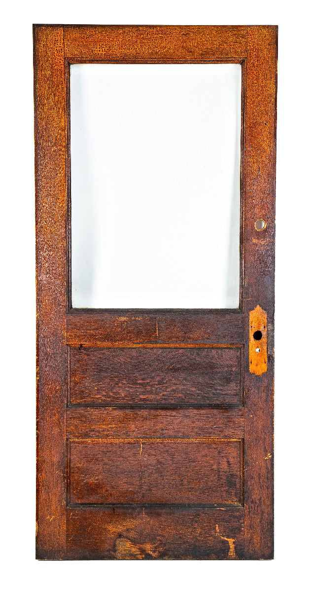highly sought after original late 19th or early 20th century salvaged chicago oak wood door with beveled edge glass pane