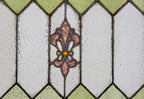 early 20th century original salvaged chicago double-sash leaded art glass window with picket fence and fleur-de-lis design motifs