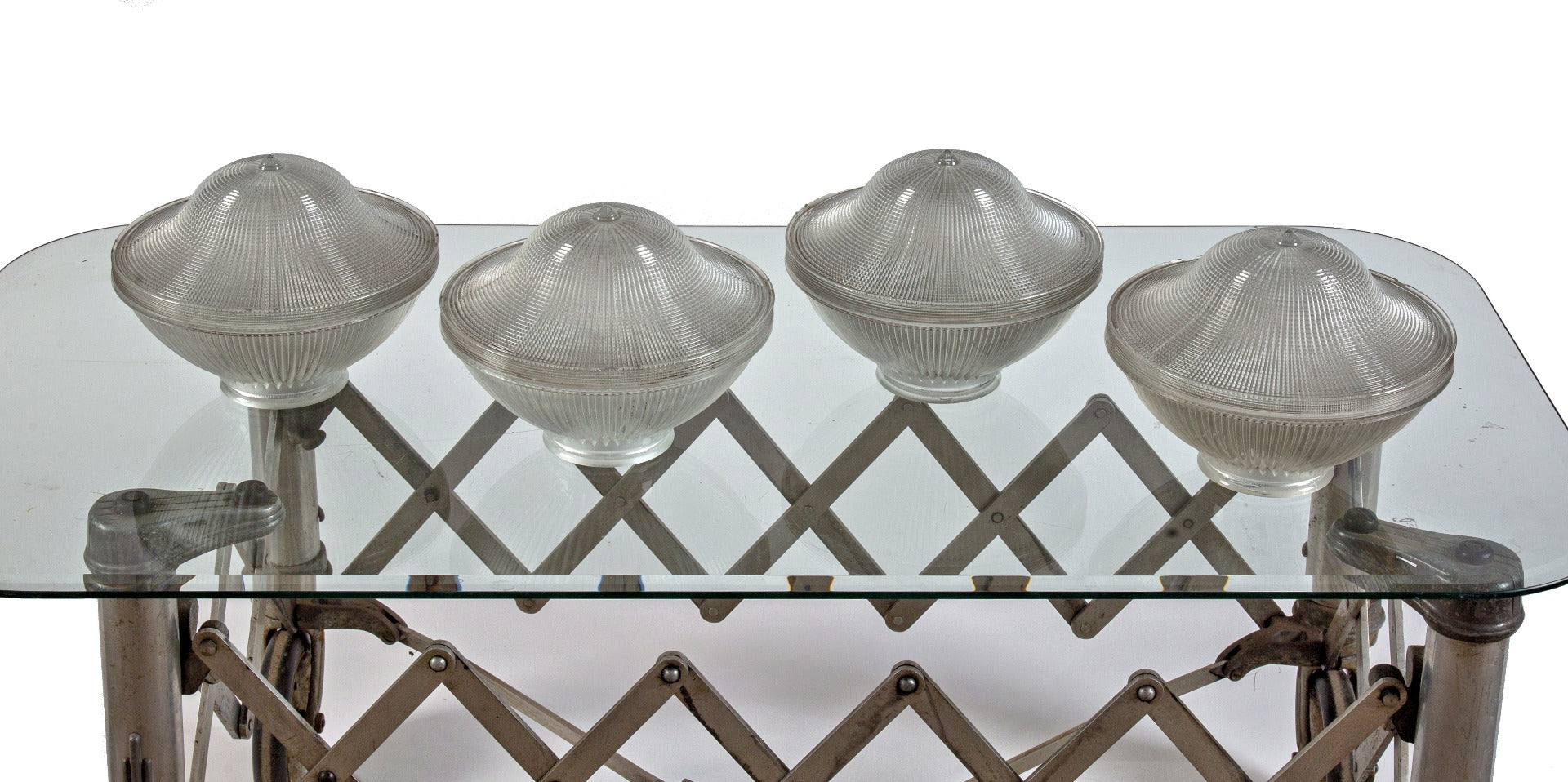 four matching highly sought after two-part patented early 20th century holophane company prismatic glass globes