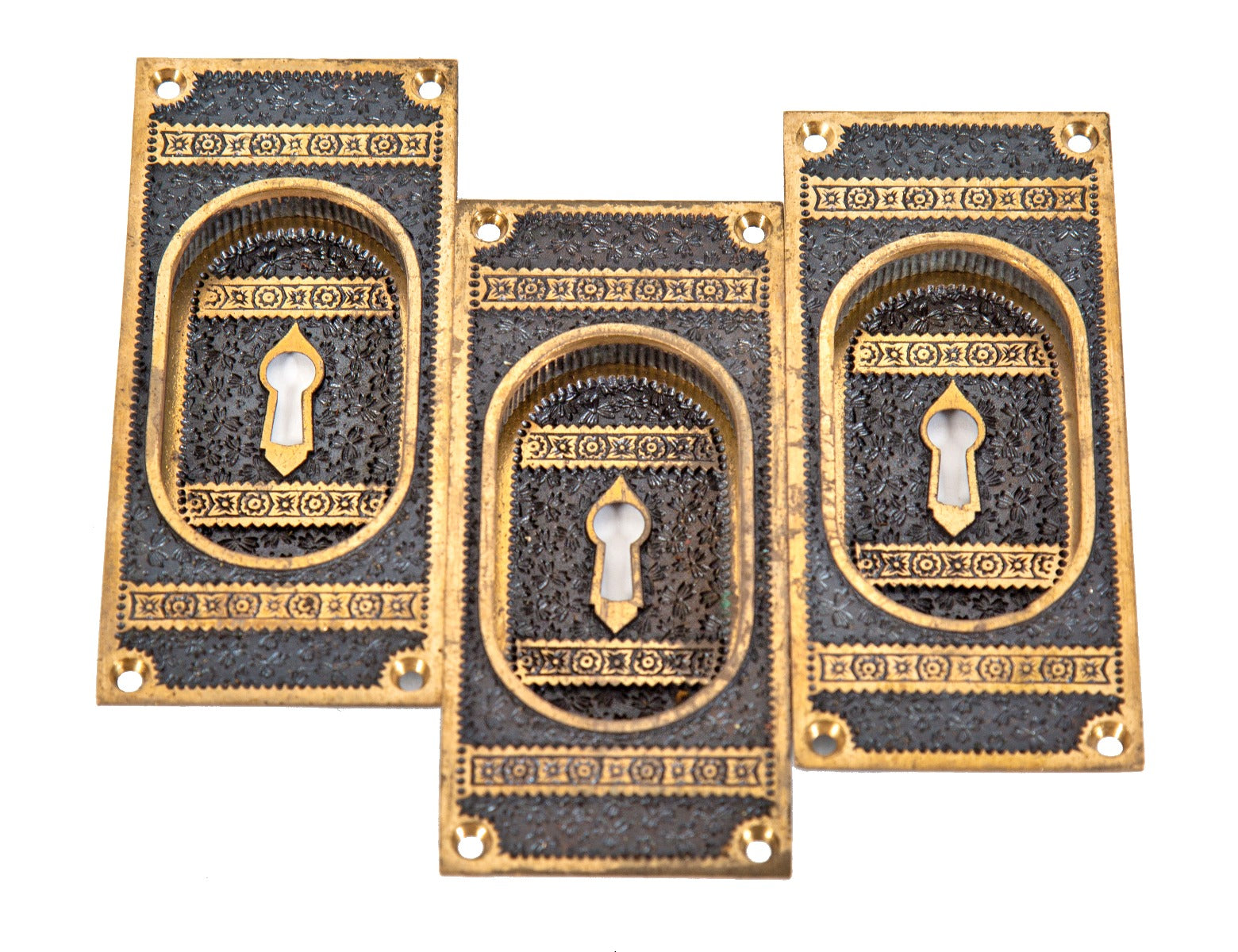 group of three matching 1880s eastlake style "new old stock" cast bronze ivy pattern branford cast bronze pocket door plates