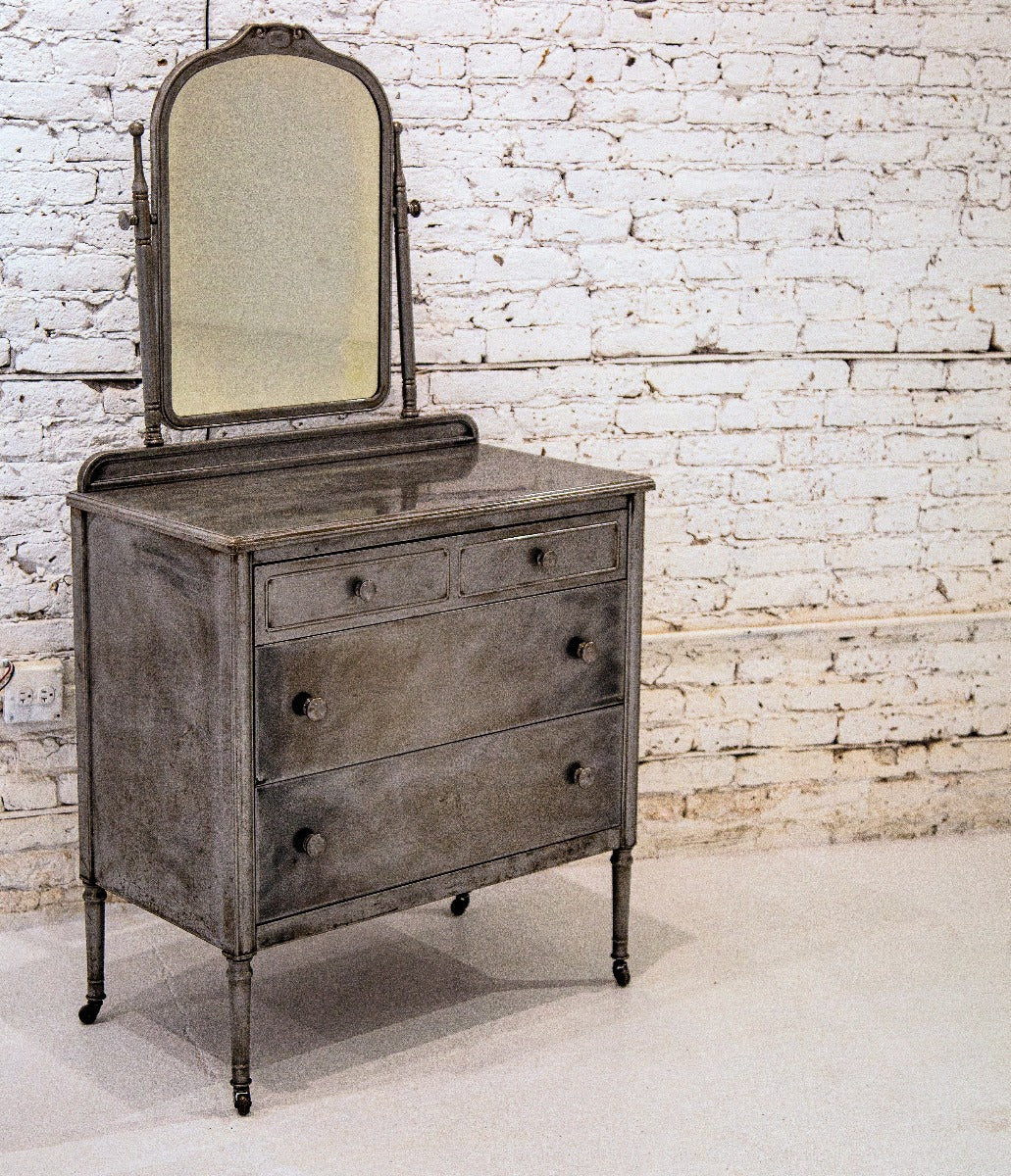 thoroughly cleaned and refinished antique american industrial cold-rolled steel simmons lowboy cabinet with tilting mirror