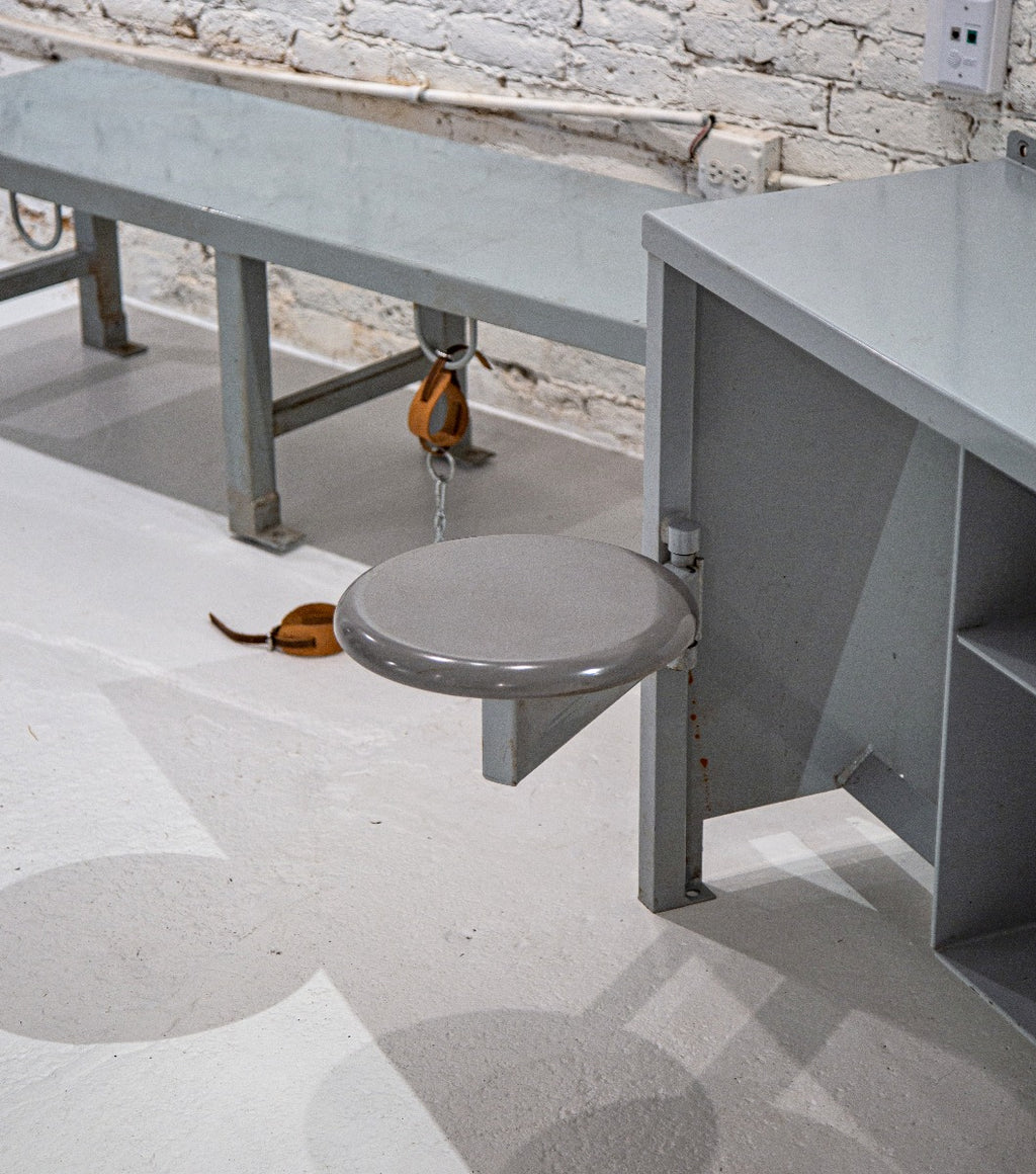 heavy duty all-welded joint heavy gauge steel cook county jail bench with integrated rings for handcuffs