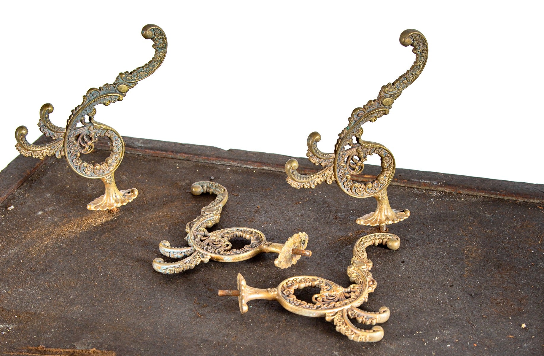 four matching oversized heavily ornamented 19th century gilded age oversized hall tree coat hooks with nicely aged patina