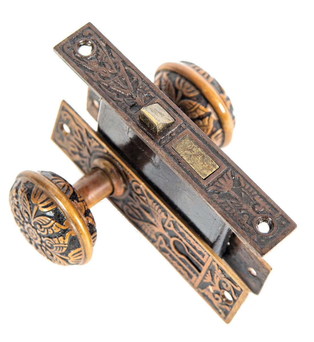 19th century interior residential eastlake style cast brass "oriental" pattern passage door lockset with nicely aged patina