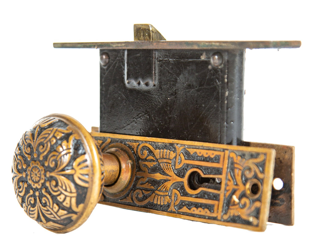 19th century interior residential eastlake style cast brass "oriental" pattern passage door lockset with nicely aged patina