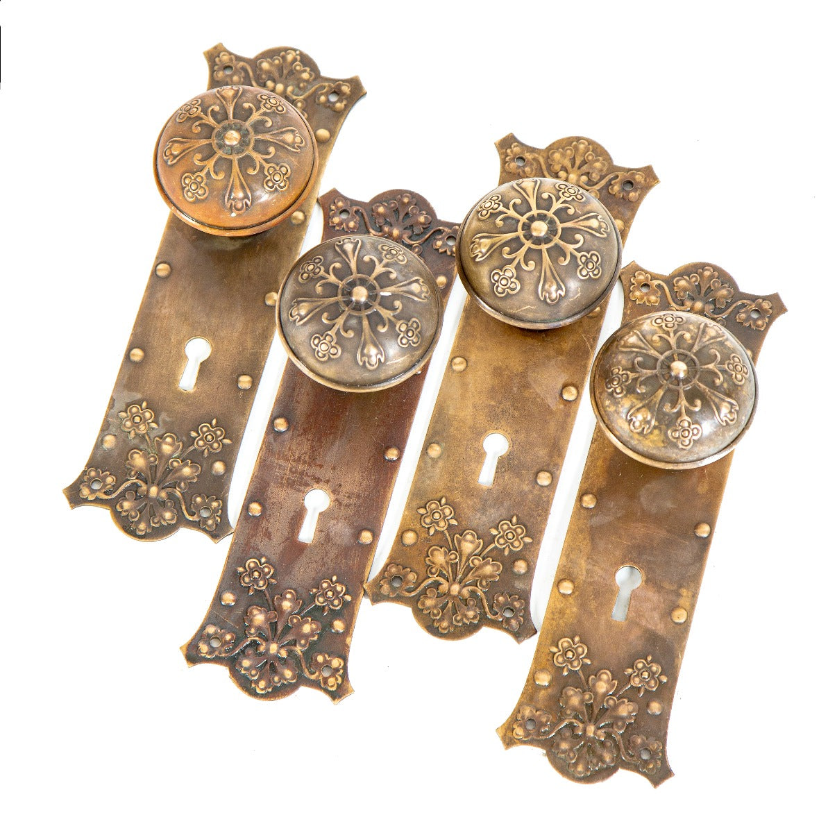 lot of matching original wrought ornamental brass salvaged chicago doorknobs and backplates with nicely aged patina