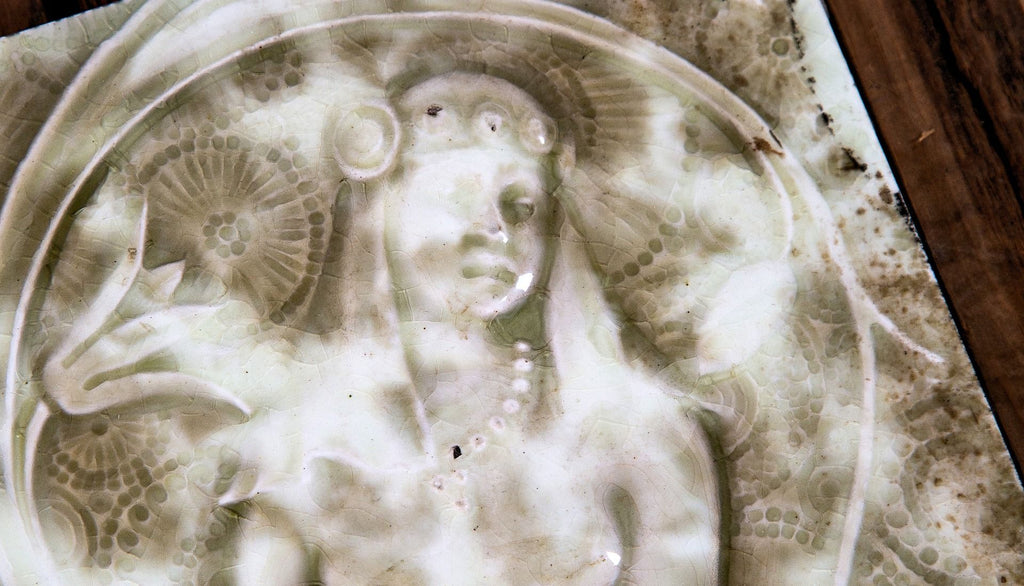 pair of 19th century mottled green antique american egyptian revival full-figured majolica fireplace tile sets