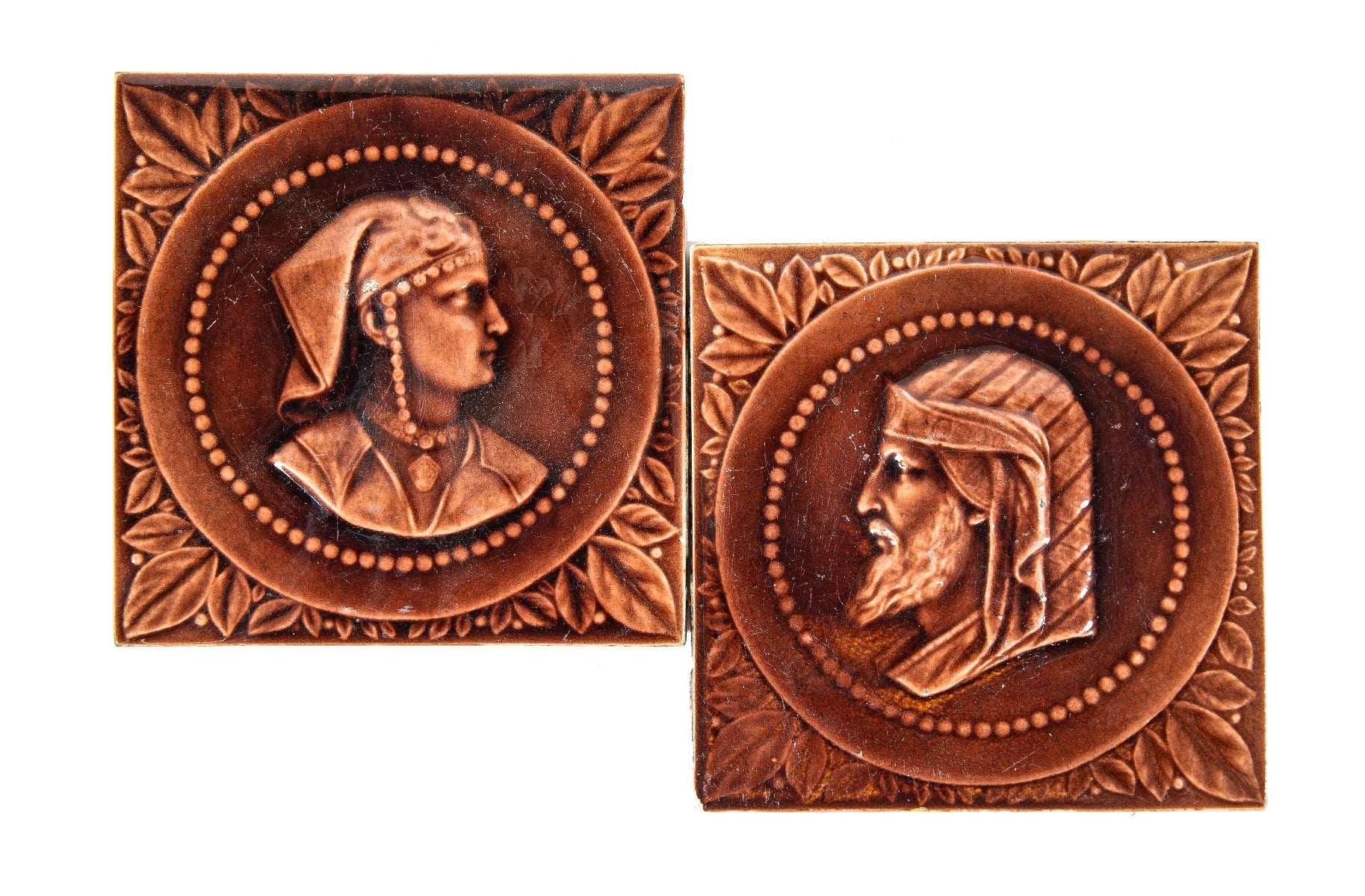 two matching 19th century burgundy-colored majolica-glazed salvaged fireplace figural tiles by kensington