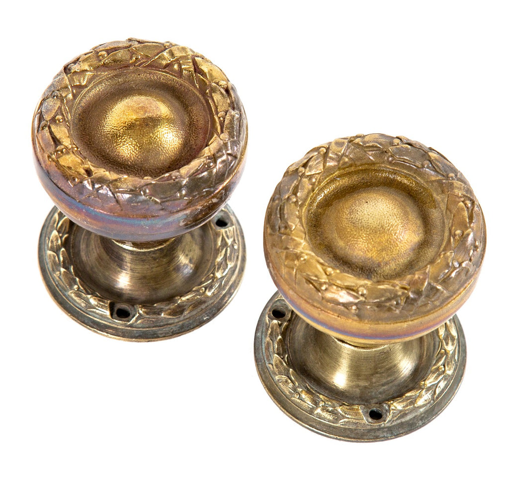 matching set of original ornamental cast brass cook county or chicago city hall building doorknobs and rosettes designed by holabird and roche