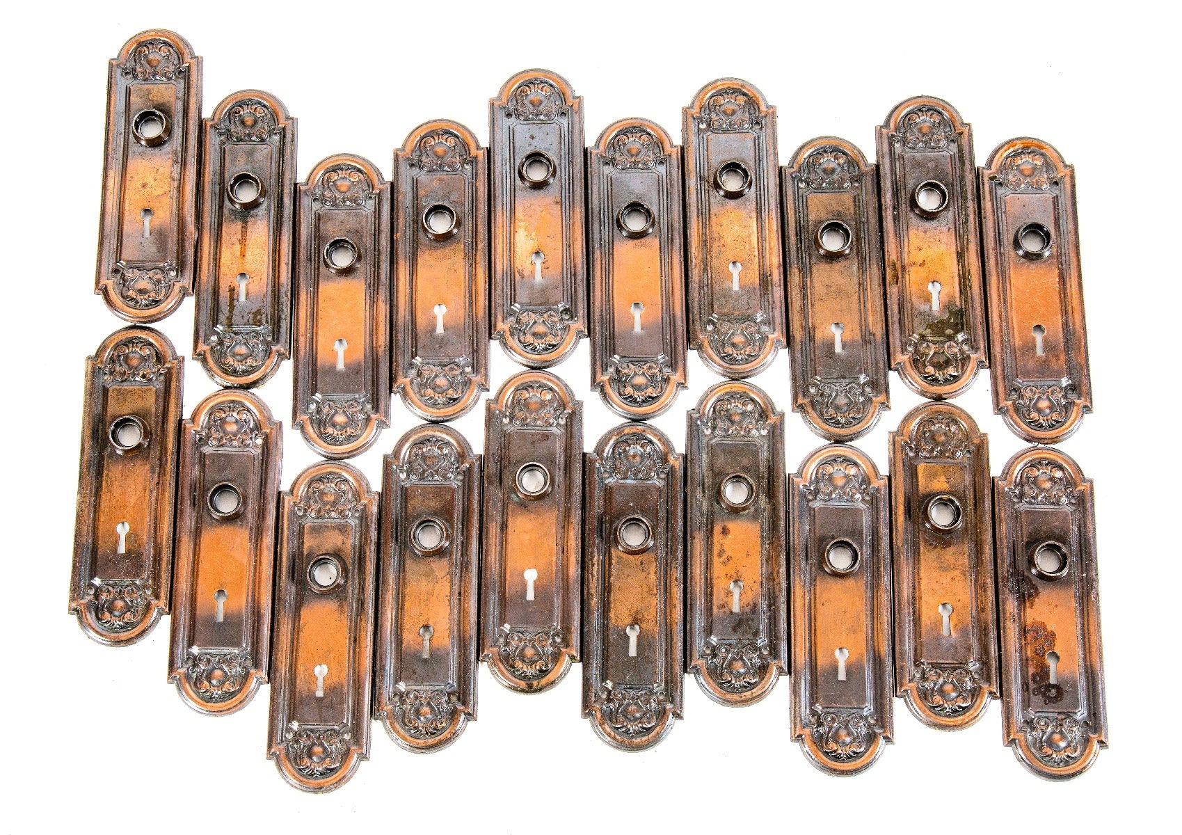 large lot of original early 20th century antique american stamped ornamental steel passage door backplates with oxidized copper-plated finish