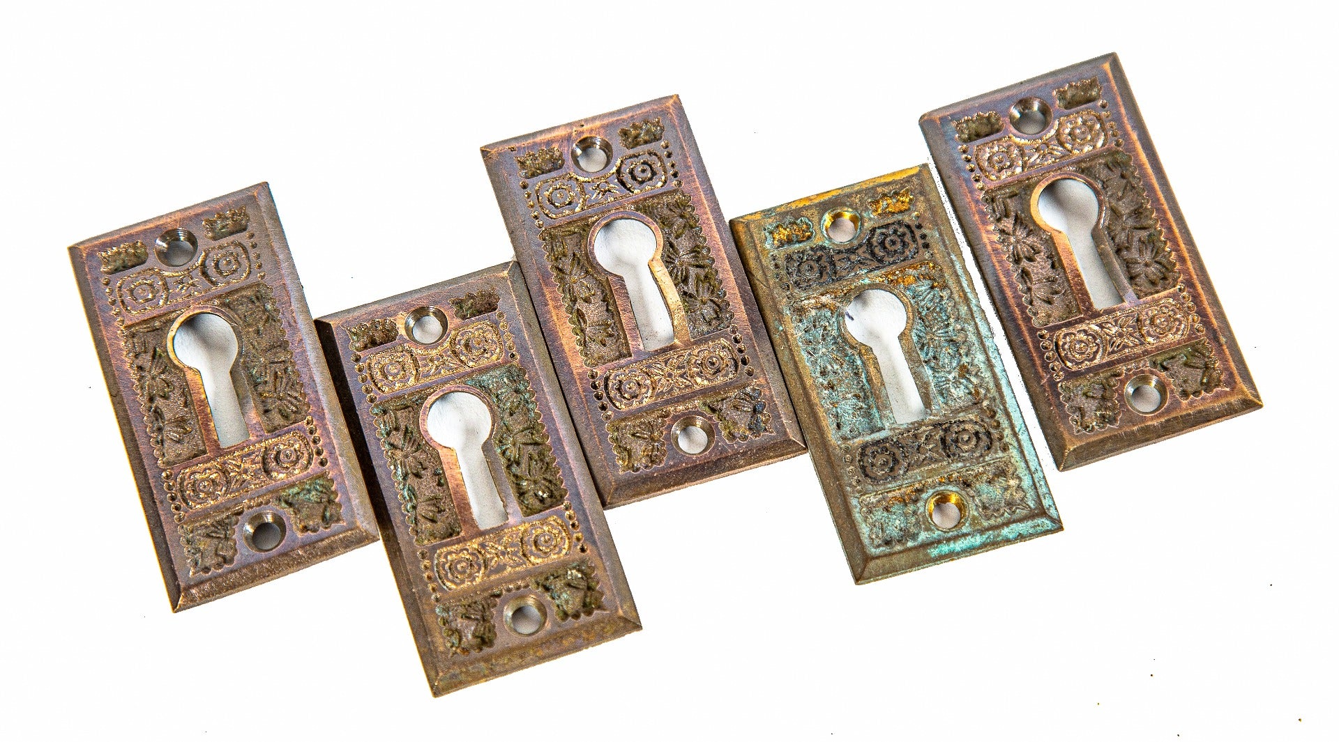 group of five matching 19th century american eastlake style cast bronze "ivy" pattern keyplate by branford lock works