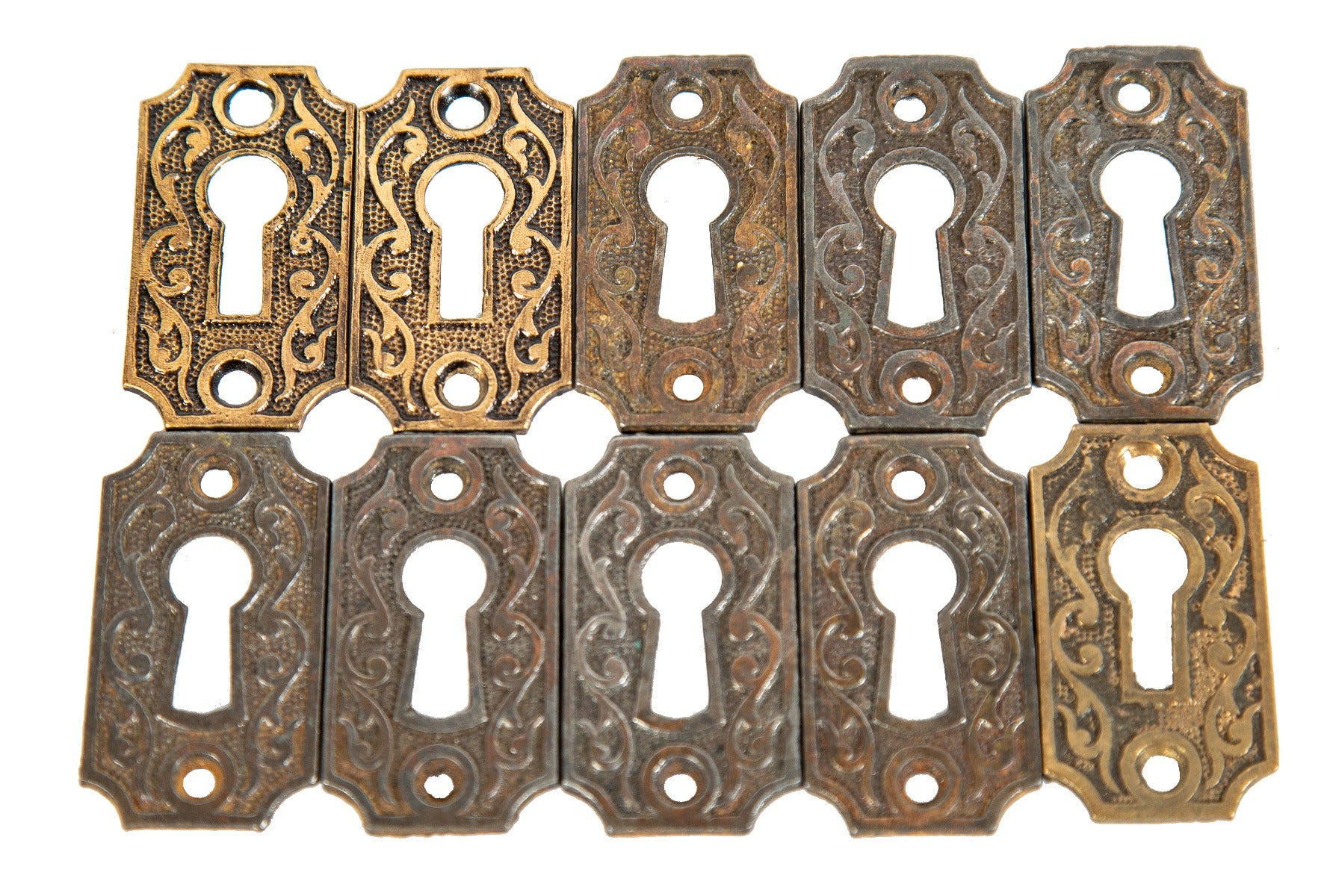 ten original 19th century ornamental cast brass and iron interior residential passage door keyplates with nicely aged patina
