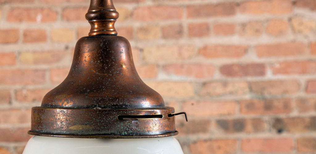 unique late 19th century copper-plated brass multi-part reliance building interior hallway pendant light with schoolhouse style globe