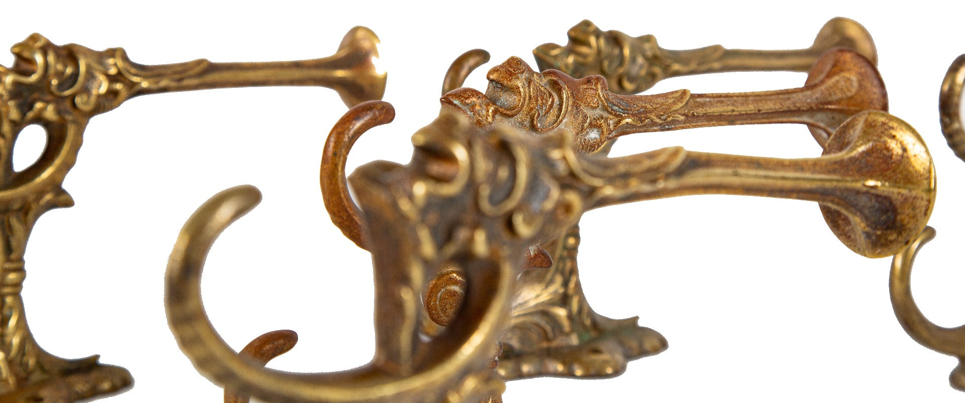group of six original 19th century ornamental figural salvaged chicago hall tree hooks comprised of bronze with nicely aged surface patina