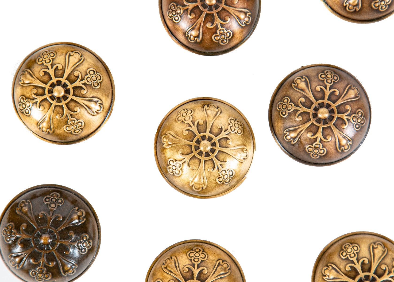 group of twelve matching antique american ornamental wrought bronze dome-shaped embossed doorknobs with banded edges