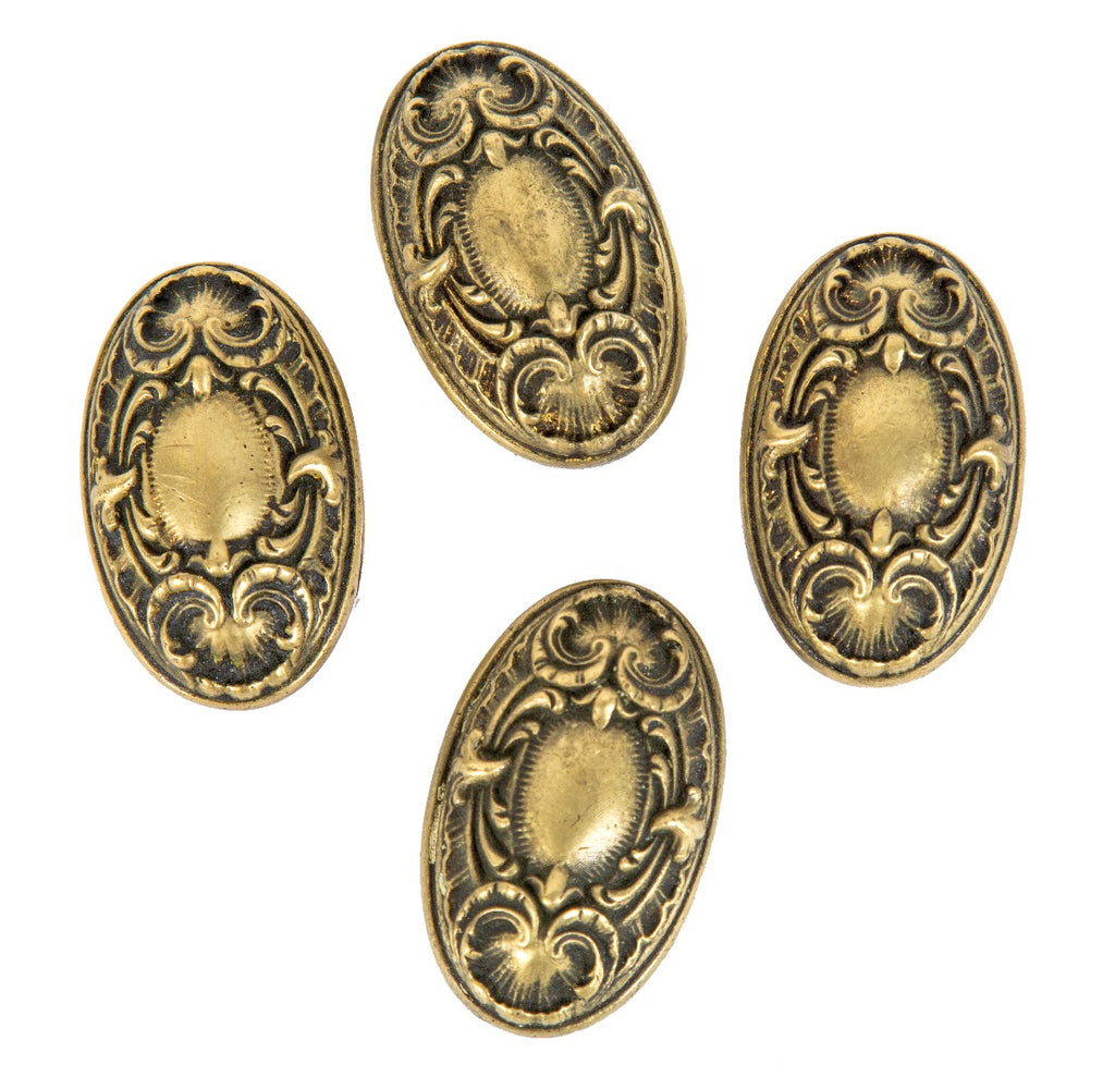 group of four matching ornamental cast brass salvaged chicago yale & towne "navarro" pattern doorknobs